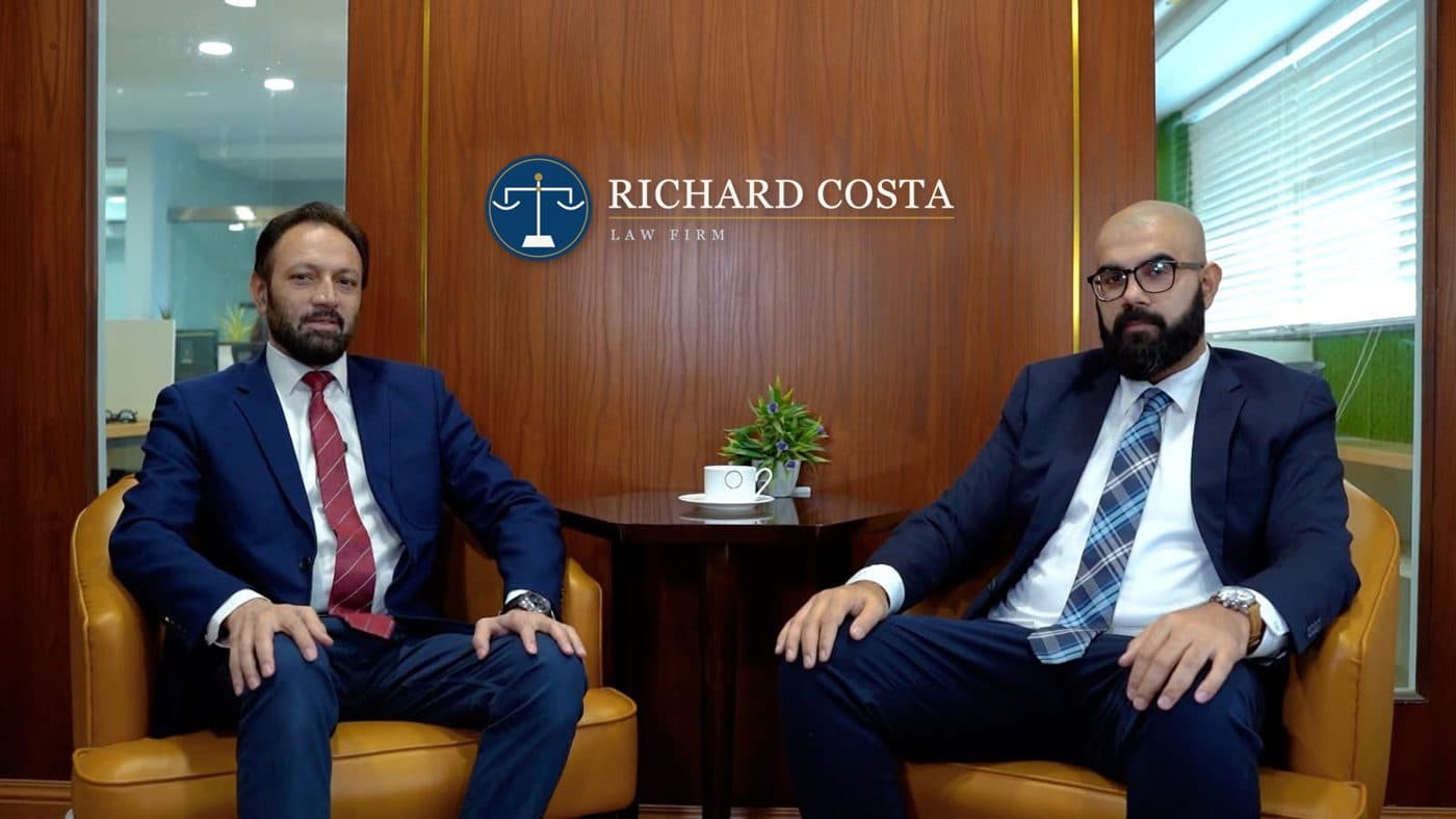 The attorneys of Richard Costa Law Firm in the firm's office